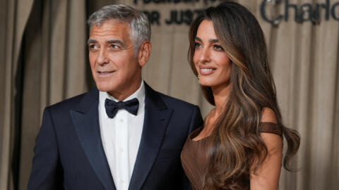 جورج كلوني وزوجته امل.