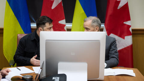 زيلينسكي وكارني في مدينة هاليفاكس الكندية 27/12/2025.